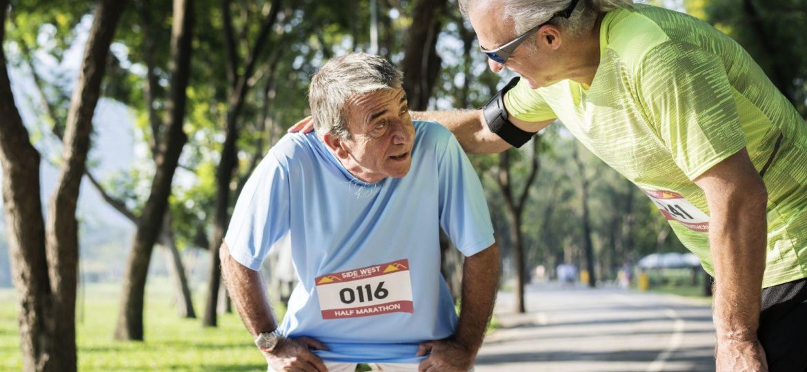 Exhausted senior runner at the park